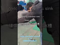 Welding the stainless water sink with the seam welding machine 
